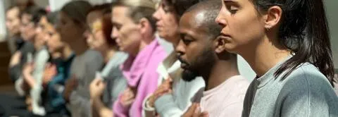 A group of people praying